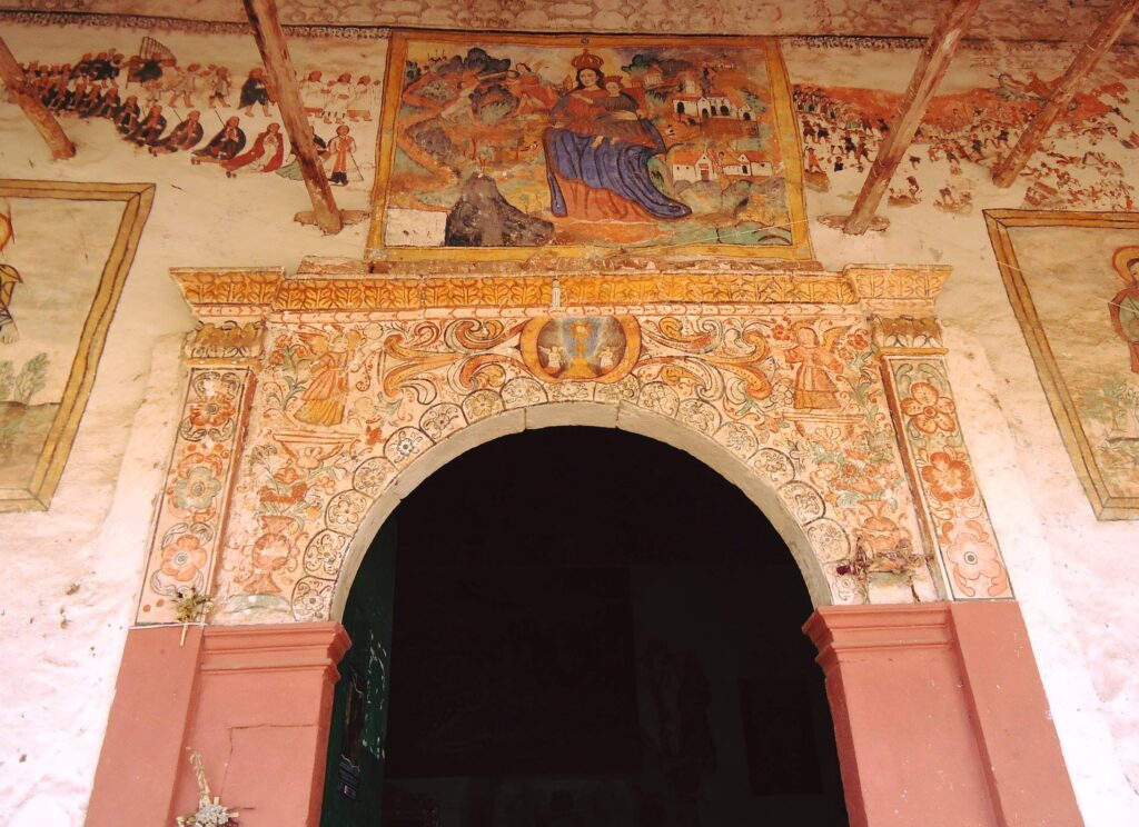 Mural de la puerta de Chinchero
